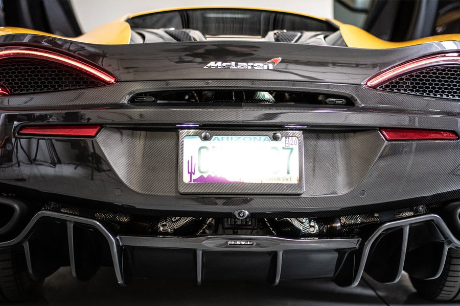 Rear view of a luxury sports car with Arizona license plate in a showroom